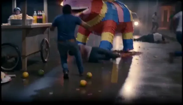 Giant pinata goes on a rampage through a night market
