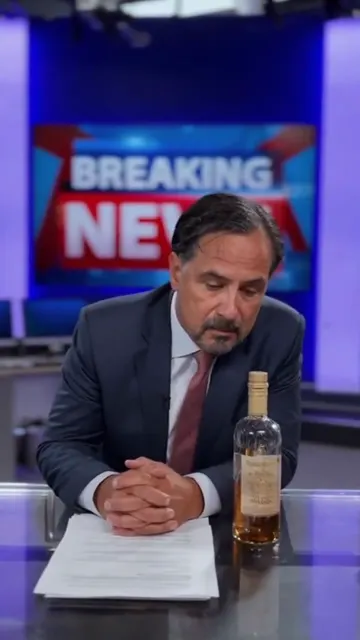 Breaking News anchor downs whiskey straight from the bottle on air